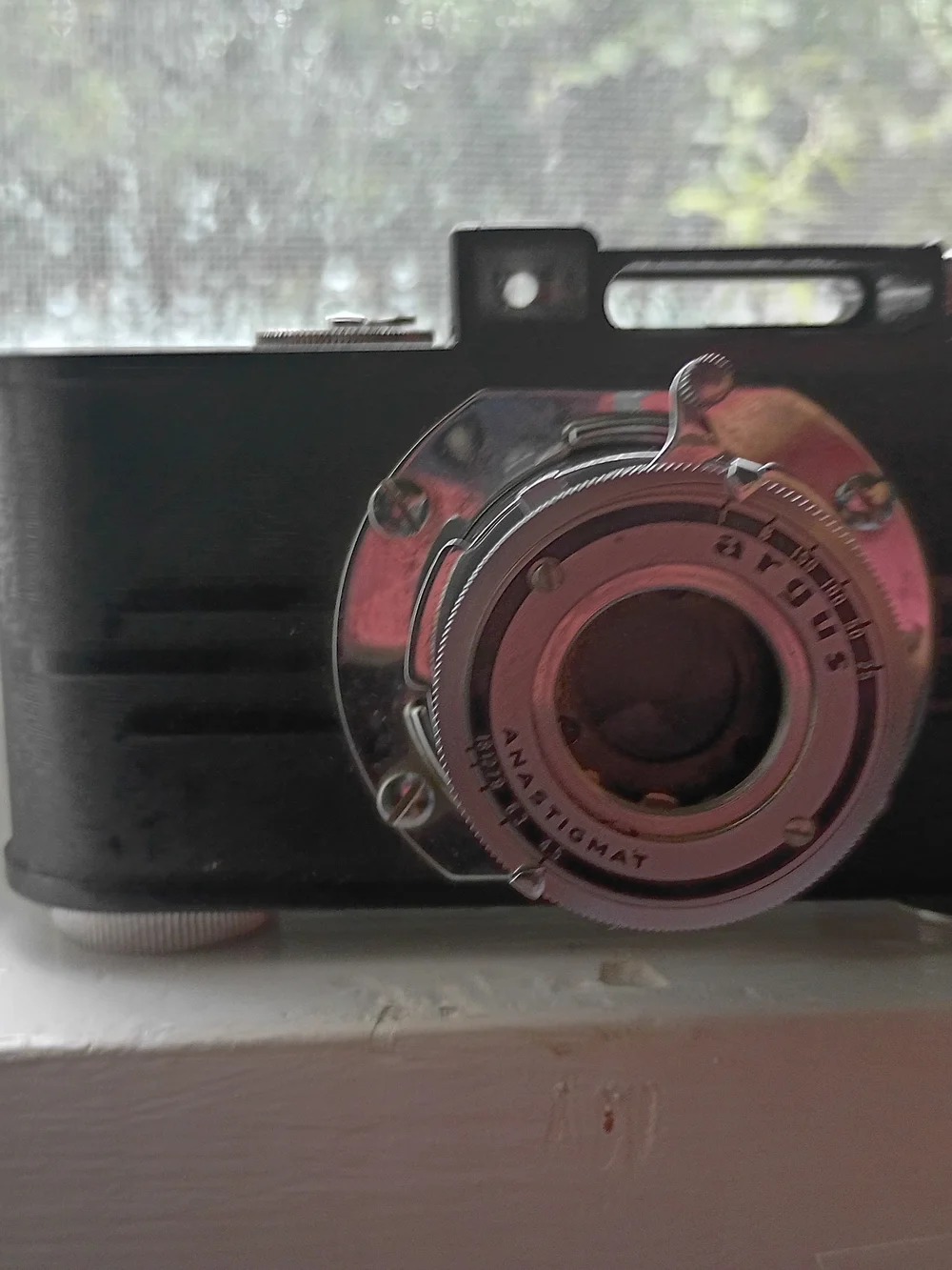 Vintage-Style Black Camera with Chrome Lens ARGUS